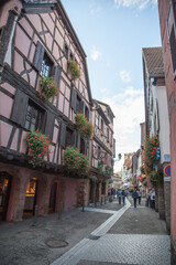 A colourful street in the town of Ribeauville (Alsace, France).
