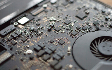 Electronic circuit board close up. Blurred background