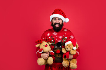 Time to celebrate. new year mood. christmas shopping. sales and discounts. buy xmas gifts. cheerful santa man hipster with toy. preparation and celebration. funny party time. happy winter holidays