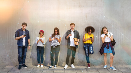 Fototapeta premium Diverse people using phones in a city