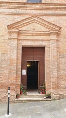 Fototapeta na wymiar Facade of the Church of Sant'Apollinare in the centre Chiusi, Tuscany.