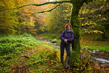 Woman nature photographer with camera