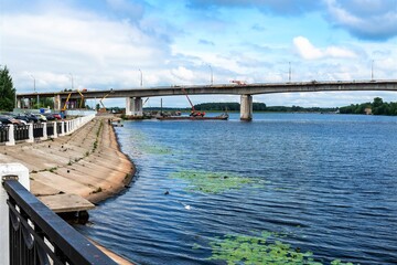 Russia, Kostroma, July 2020 . View of a large concrete bridge over the Volga river.