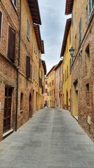 Narrow street in Chiusi, Tuscany.