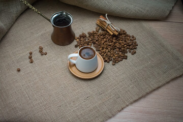 Traditional Turkish coffee and coffee beans.