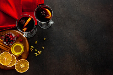 Christmas hot drink in glasses - mulled red wine with spices and decoration