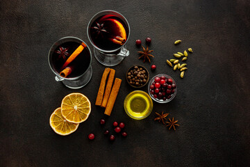 Christmas hot drink in glasses - mulled red wine with spices and decoration