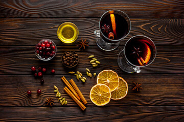 Mulled wine recipe - ingredients for Christmas hot drink in glasses