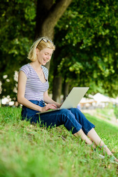 Being outdoors exposes workers to fresher air and environmental variations making happy and healthy on physical and emotional level. Girl laptop outdoors. Why employees need to work outdoors