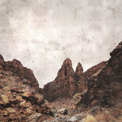 stylish textured old paper background with landscape of Gran Canaria, deep ravine Barranco Hondo