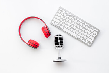 Microphone and headphones on studio table, top view. Audio equipment and recording