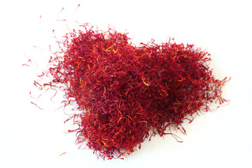 Naklejka premium Italian saffron called Zafferano di Navelli in the province of L'Aquila in the Abruzzo region of central Italy isolated on white background