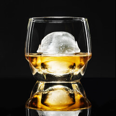 Whisky with sphere ice fancy cocktail