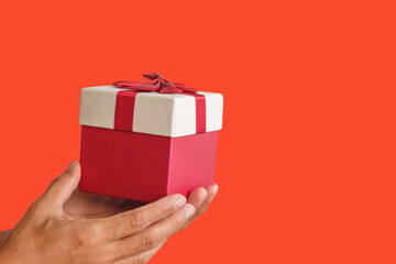 Hands delivering gifts isolated on background