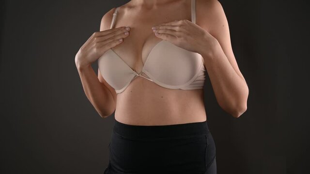 The girl wants to enlarge her breasts. High quality video.