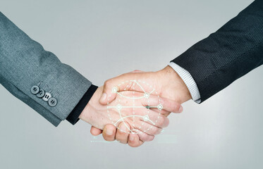 Business people shaking hands for a deal
