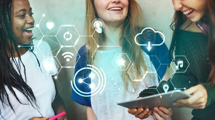 Cheerful friends using a tablet