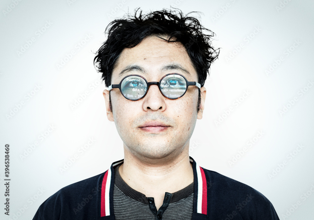 Poster asian hacker with computer code on his glasses