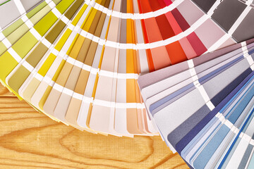 Close-up on color palette guide for printing and painting. Concept - choice of colors for design.