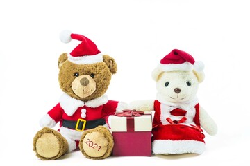Couple teddy bear doll wearing santa set with red gift box isolated on white background,Christmas day and New Year's gifts