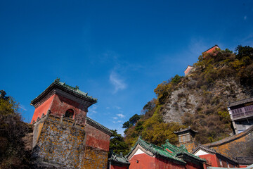 Fototapeta na wymiar high view of Golden Palace (Palace of Harmony) is located on the highest peak in Wudang.