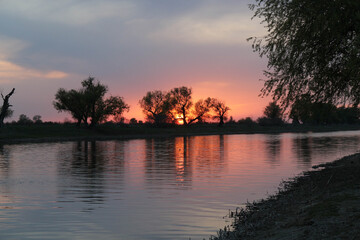 Sunset on the river in summer