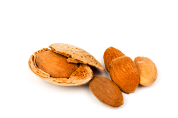 almond nuts in close-up, isolated on white background