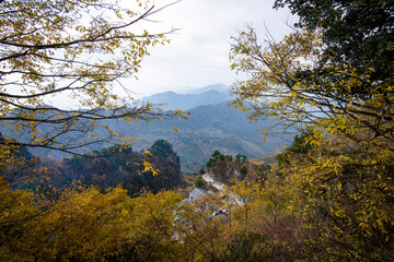 Fototapeta na wymiar High view of Golden Palace (Palace of Harmony) is located on the highest peak in Wudang.