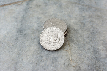 Half dollar coin on a stone background