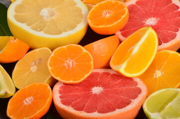 Close-up of sliced citrus fruits, Various citrus fruits, Citrus background