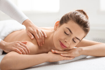 Obraz na płótnie Canvas Closeup of peaceful lady having back massage