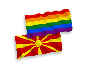 National vector fabric wave flags of Rainbow gay pride and North Macedonia isolated on white background. 1 to 2 proportion.