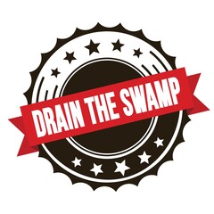 DRAIN THE SWAMP text on red brown ribbon stamp.