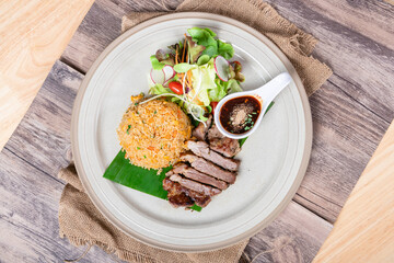 
fried rice with Thai basil and crispy belly pork - Thai food style
