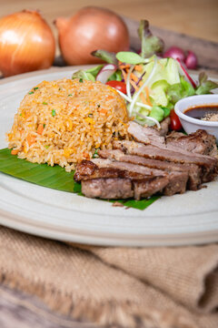 
fried rice with Thai basil and crispy belly pork - Thai food style
