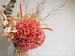 Dried flower arrangement in soft pink tones