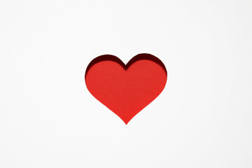 heart card cut out of paper on a red background. Valentine's day greeting card. I love you. Red heart greeting card
