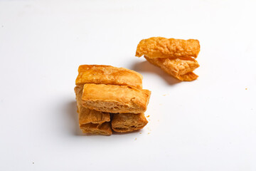 indian khari or kharee or salty Puff Pastry Snacks in wooden bowl
