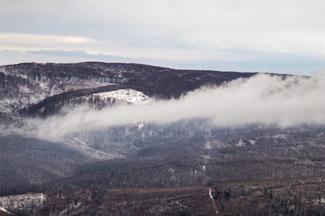 Winter landcapes of city and mountains..