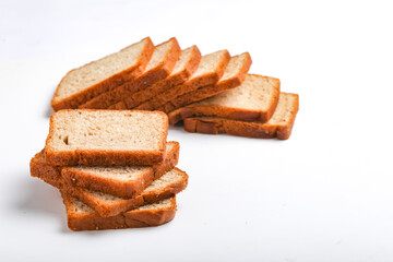 Cut of loaf bread on white against white background