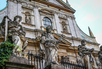 Fototapeta na wymiar Statues of the saints outside the Saints Peter and Paul Church, Krakow, Poland
