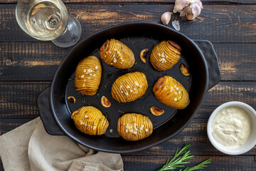 Baked potatoes with rosemary and garlic. Healthy eating. Vegetarian food.