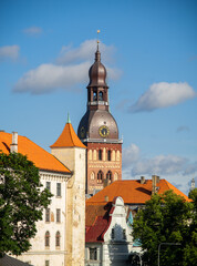 Tower of Riga Cathedral behind Riga Castle walls in Old Riga.