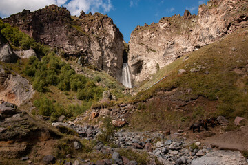 big waterfall in the mountains