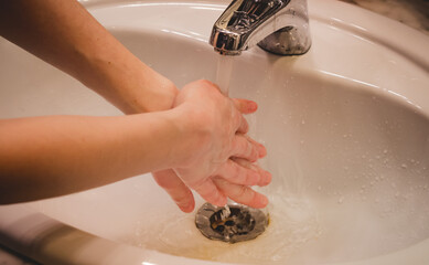 Washing hands rubbing with soap man for corona virus prevention, hygiene to stop spreading...