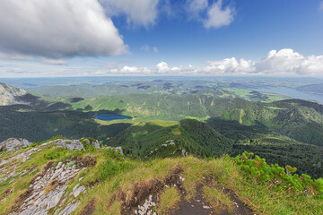 Fototapeta premium The pre Alps with the Traunsee, the Vorderer Langbathsee and the Attersee, seen from the the summit of the Alberfeldkogel