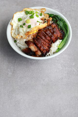 Char Siu Served With Rice In Bowl With Fried Egg And Vegetable. Chinese food, Cantonese cuisine.
