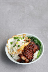 Char Siu Served With Rice In Bowl With Fried Egg And Vegetable. Chinese food, Cantonese cuisine.