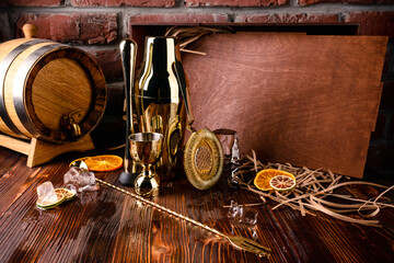 Set of bar or pub accessories with martini cocktail shaker. Set for the bartender Bar spoon, jiger,...