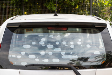 Bubble formed on car rear glass wind screen tint film suggest inferior quality